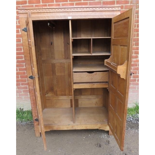 720 - An early Mouseman burr oak panelled double wardrobe from the Kilburn workshops of Robert Thompson, c... 