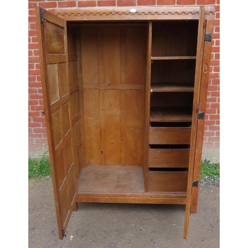 721 - An early Mouseman burr oak panelled double wardrobe from the Kilburn workshops of Robert Thompson, c... 