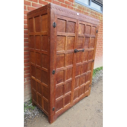 722 - An early Mouseman burr oak panelled double wardrobe from the Kilburn workshops of Robert Thompson, c... 