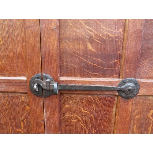 722 - An early Mouseman burr oak panelled double wardrobe from the Kilburn workshops of Robert Thompson, c... 