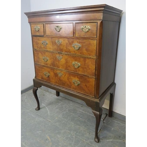 736 - A Georgian walnut chest on stand, housing three short over three long graduated cock-beaded drawers ... 