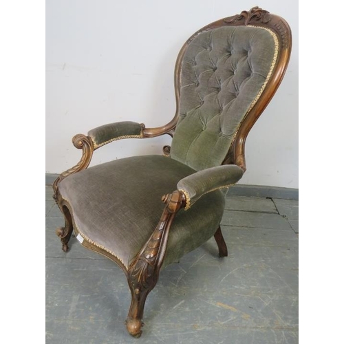 755 - A Victorian mahogany show-wood open-sided armchair, the carved frame with scrolled and acanthus leaf... 