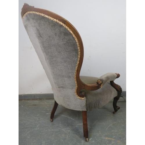 755 - A Victorian mahogany show-wood open-sided armchair, the carved frame with scrolled and acanthus leaf... 