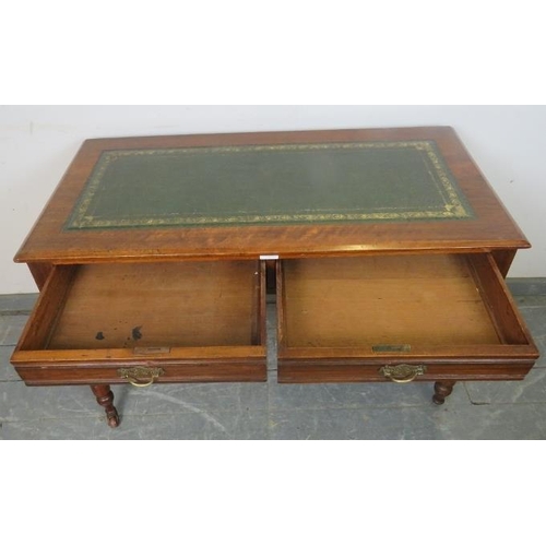 758 - An Edwardian mahogany writing table with inset gilt tooled green leather surface, housing two short ... 