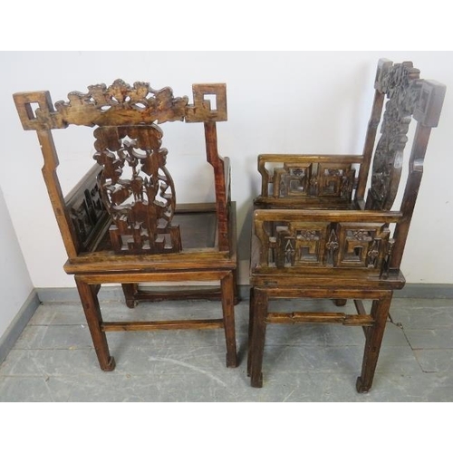 759 - A pair of early 20th century Chinese armchairs in the 19th century style, with ornately carved and p... 