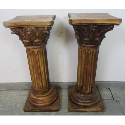 765 - A pair of plant stands in the form of Corinthian columns with acanthus carved capitols and reeded up... 