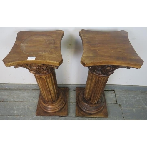 765 - A pair of plant stands in the form of Corinthian columns with acanthus carved capitols and reeded up... 