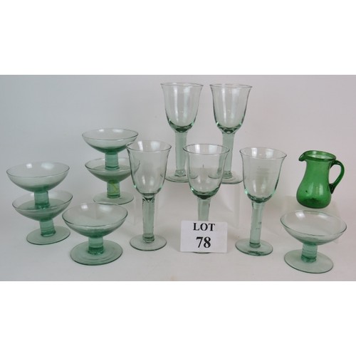 271 - A set of six green recycled glass stemmed dessert bowls, 5 large wine goblets and a hand blown green... 