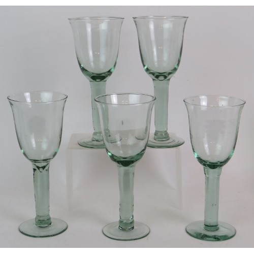 271 - A set of six green recycled glass stemmed dessert bowls, 5 large wine goblets and a hand blown green... 