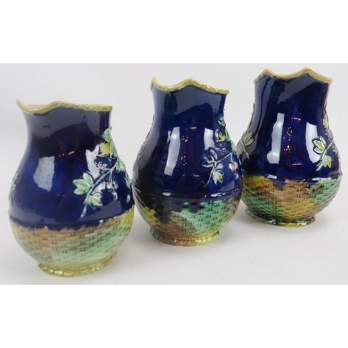 248 - Set of three Majolica Blackberry pattern jugs in graduated sizes. Largest 8