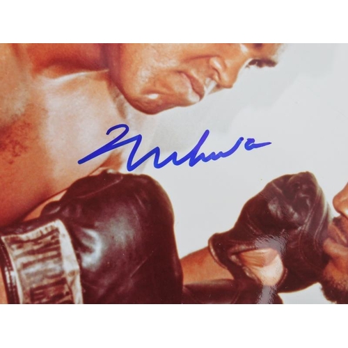 253 - Sporting memorabilia: A signed colour photograph of Muhammad Ali & Joe Frazier. Both boxers signatur... 