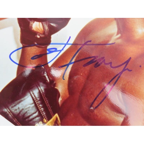 253 - Sporting memorabilia: A signed colour photograph of Muhammad Ali & Joe Frazier. Both boxers signatur... 