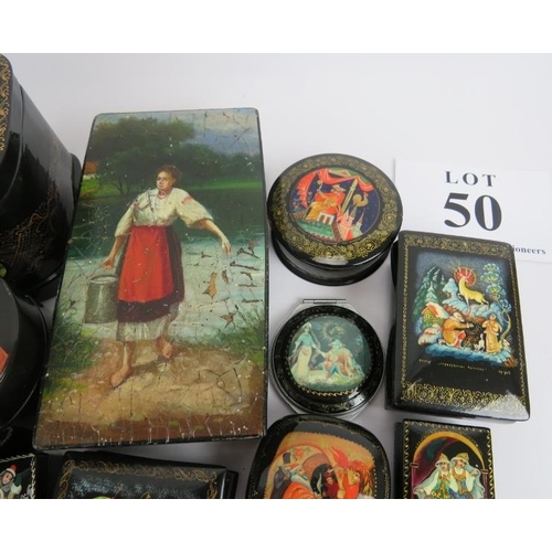 275 - Collection of thirty six Russian lacquer papier Mache boxes, hair slides, brooches, some signed. (36... 