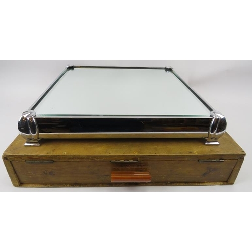 105 - A large mirror topped cake stand with matching case, 20th century. Of square form with a bevelled mi... 