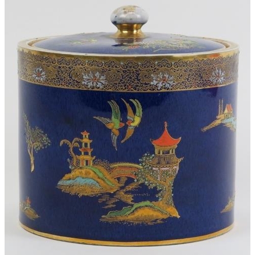 111 - A Carlton Ware Mikado pattern tea caddy, circa 1920s. Of cylindrical form with gilt highlighted and ... 