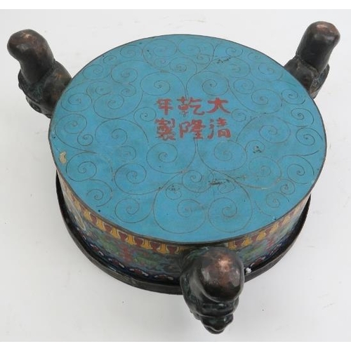 12 - A Chinese cloisonné enamelled bronze tripod jardiniere. Decorated to both the interior and exterior ... 