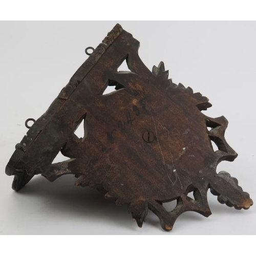 123 - A Black Forest carved wood wall bracket, 19th century. Carved depicting a goat enclosed by a grape a... 