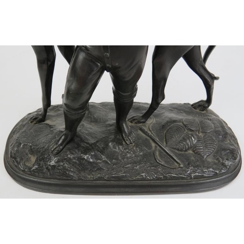 124 - A bronzed spelter statue of a boy with greyhound, probably 19th century. 7.8 in (19.8 cm) length. Co... 