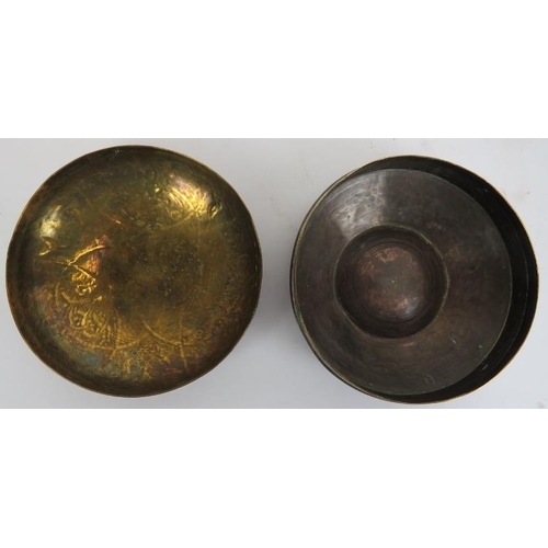 132 - Four Middle Eastern metalware objects, 19th century or earlier. (4 items) Disc: 12.6 in (32 cm) diam... 