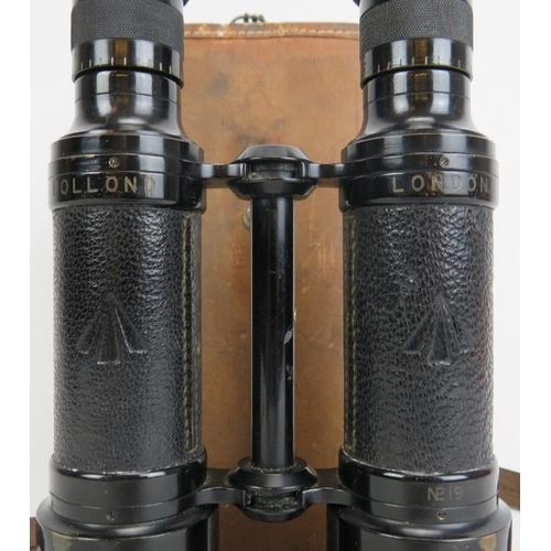 136 - A rare pair of Dolland of London field binoculars, early 20th century. When viewed the image is inve... 