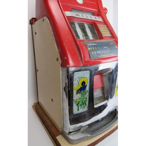 148 - An original vintage Mills three drum one arm bandit slot machine. Red enamelled and chrome mounts wi... 