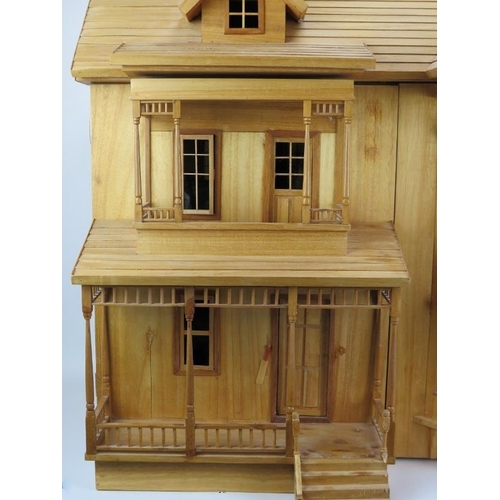 151 - A large English Imporient Limited ‘Timberlina’ dolls house, 20th century. Of modern construction, pe... 