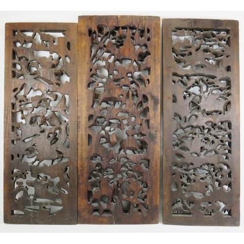 16 - Three Chinese carved wood panels, 20th century. Carved in openwork depicting scenes of warriors. (3 ... 