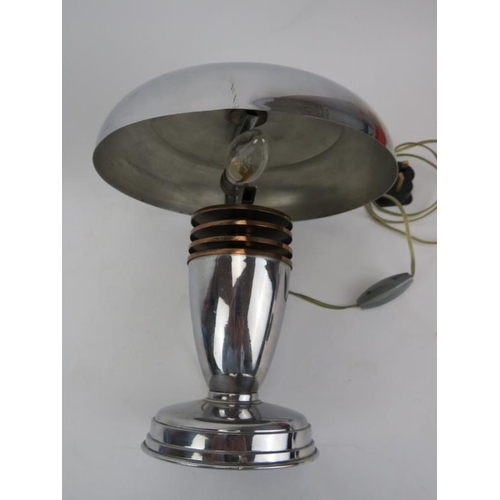 163 - A modernism chrome and copper table lamp, circa 1930s. 10.8 in (27.5 cm) height. 
Condition report: ... 