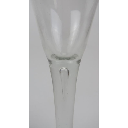 167 - Two Georgian English wine glasses, 18th century. Comprising a tear drop stem glass with folded foot ... 