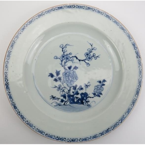 174 - A group of five Chinese blue and white porcelain dishes, 18th century. Decorated in a variety of pat... 