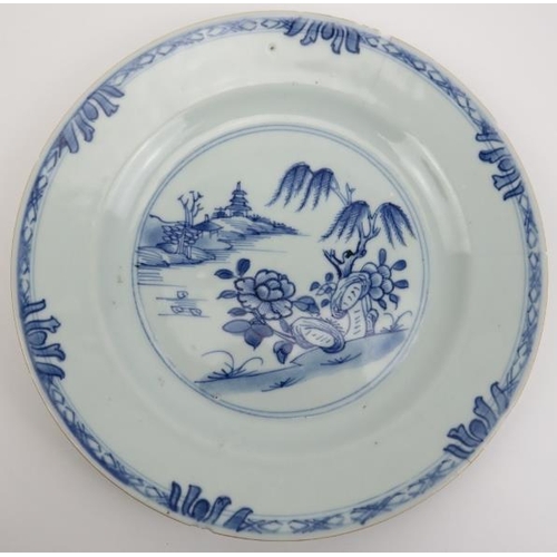 174 - A group of five Chinese blue and white porcelain dishes, 18th century. Decorated in a variety of pat... 