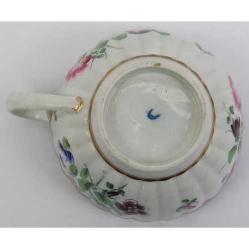 177 - An early Worcester gilt and enamel decorated porcelain teacup and saucer, circa 1755 - 1790, George ... 