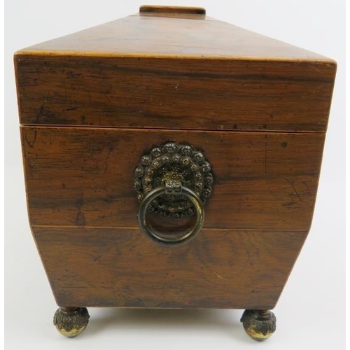 188 - A late Georgian rosewood tea caddy. Of sarcophagus form with twin handles, three internal compartmen... 