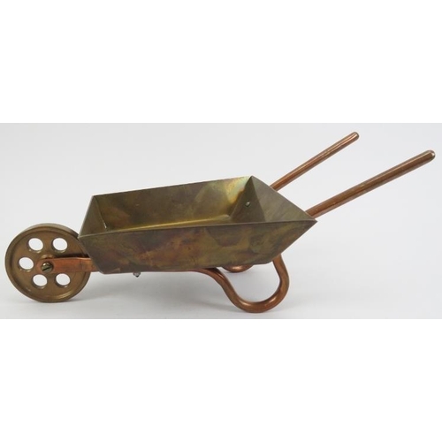 189 - A collection of brass and copper miniature and mechanical music models. Comprising a brass mechanica... 