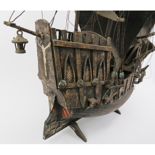 190 - Maritime: A vintage model of a 15th -16th century galleon ship. Hand crafted and painted wood with c... 