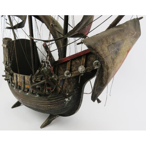 190 - Maritime: A vintage model of a 15th -16th century galleon ship. Hand crafted and painted wood with c... 