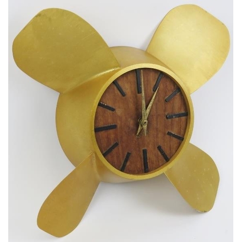 192 - A Selva ships propeller wall clock, circa 1960s. With a wooden dial and gilt metal propeller case. B... 