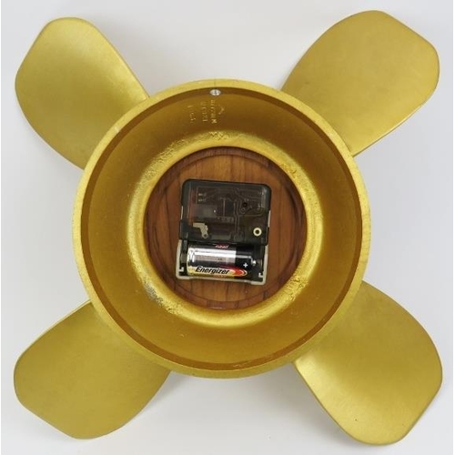 192 - A Selva ships propeller wall clock, circa 1960s. With a wooden dial and gilt metal propeller case. B... 