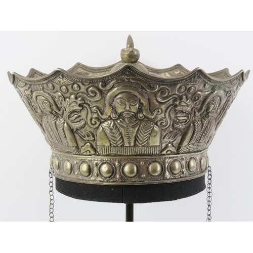 199 - A Chinese parcel gilt silver ceremonial crown, 19th century. Embossed with a central flaming pearl f... 