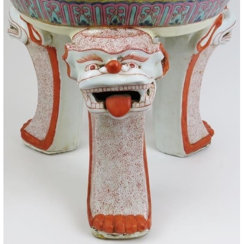 2 - A very large Chinese Famille rose porcelain tripod censor and cover. Of ding form, the pierced domed... 