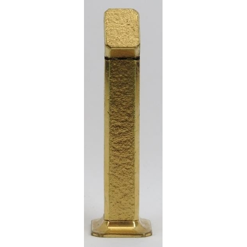 201 - A vintage Dunhill gold plated Tallboy table lighter. Of rectangular form with a flared foot. 4.3 in ... 