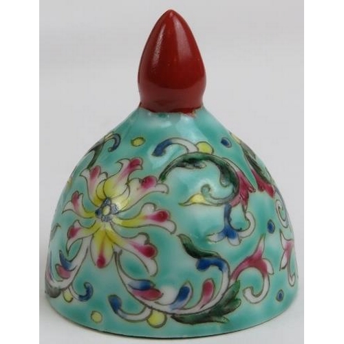 217 - An unusual Chinese famille rose enamelled hot water decanter and cover. The spout modelled with an o... 