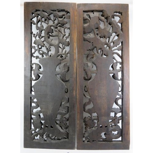 22 - A large pair of Chinese carved wood panels, 20th century. (2 items) 45 in (114 cm) approximate heigh... 