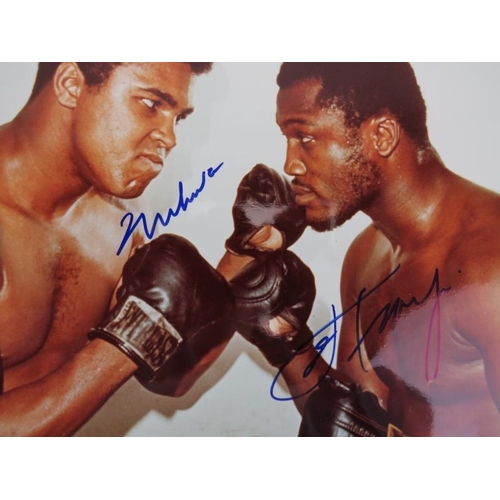 253 - Sporting memorabilia: A signed colour photograph of Muhammad Ali & Joe Frazier. Both boxers signatur... 