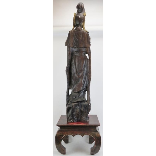 26 - A large European painted cast plaster figure of Guanyin, late 20th century. Supported on a Chinese c... 