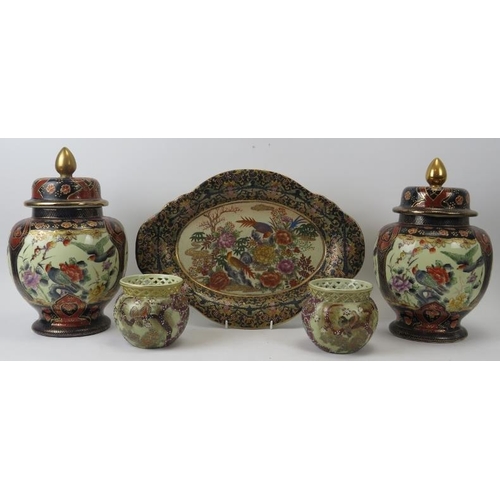 279 - A group of Japanese satsuma items, 20th century. Comprising a pair of vases with covers, a pair of v... 