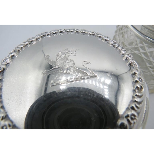 304 - A collection of three hobnail cut silver top jars, Birmingham 1913, 1912 and 1899. One with embossed... 