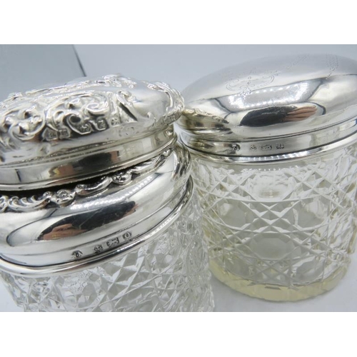 304 - A collection of three hobnail cut silver top jars, Birmingham 1913, 1912 and 1899. One with embossed... 