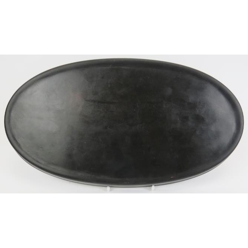 33 - A Chinese black and cinnabar lacquer tray. 12 in (30.5 cm) diameter. 
Condition report: Good conditi... 