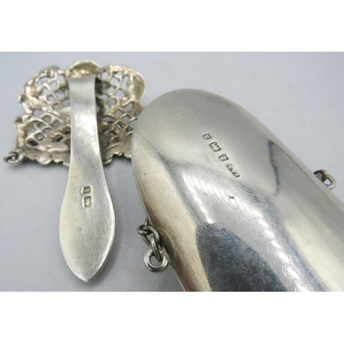 337 - A silver chatelaine with attached heavily embossed spectacle case with velvet lining, Birmingham 190... 